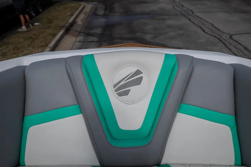 Slide: The Image of 2021 Tigé 21ZX boat interior with gray, white, and teal upholstery design. - 35