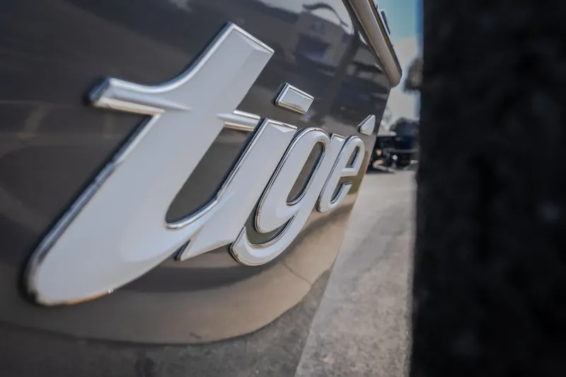 Slide: The Image of Close-up of 2021 Tigé 21ZX boat logo in sleek metallic finish. - 9