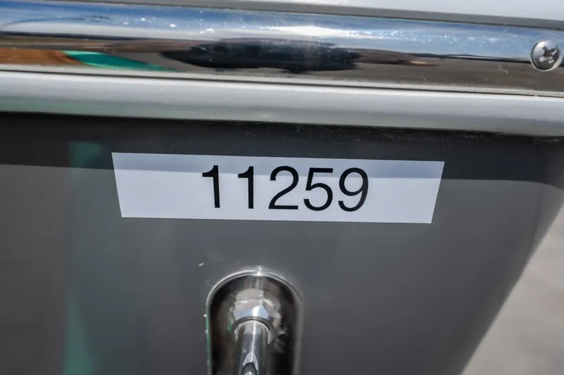 Slide: The Image of 2021 Tigé 21ZX boat with number 11259 displayed on the hull. - 8