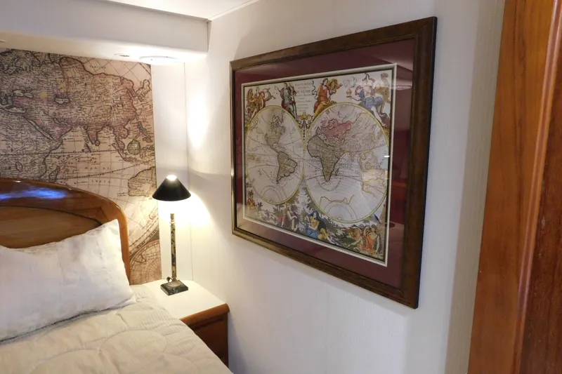 Slide: The Image of Cozy bedroom in 1996 Viking 50 Convertible with vintage world map decor. - 53