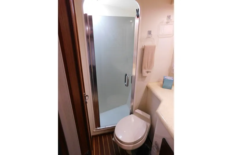 Slide: The Image of Bathroom interior of 1996 Viking 50 Convertible yacht with shower and toilet. - 47