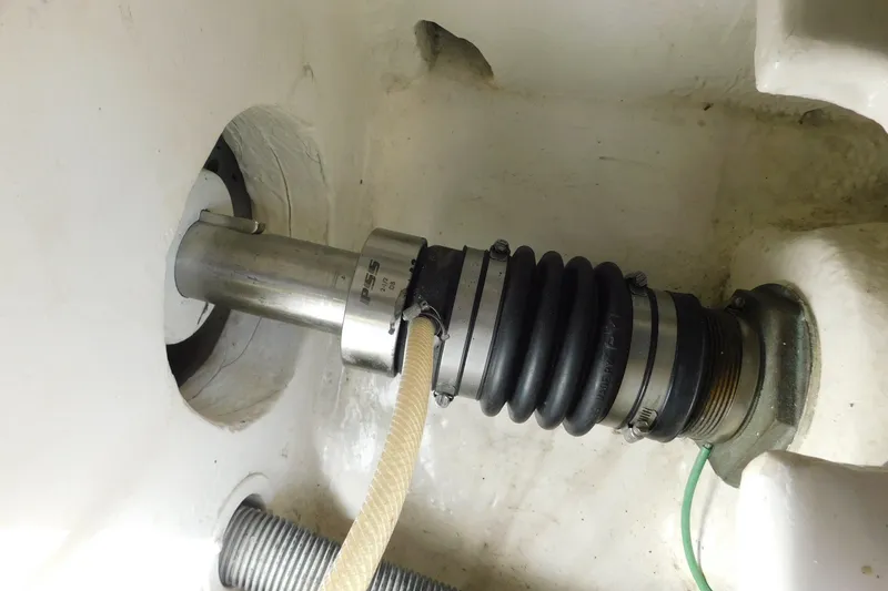 Slide: The Image of Close-up of a 1996 Viking 50 Convertible boat's shaft seal system. - 79