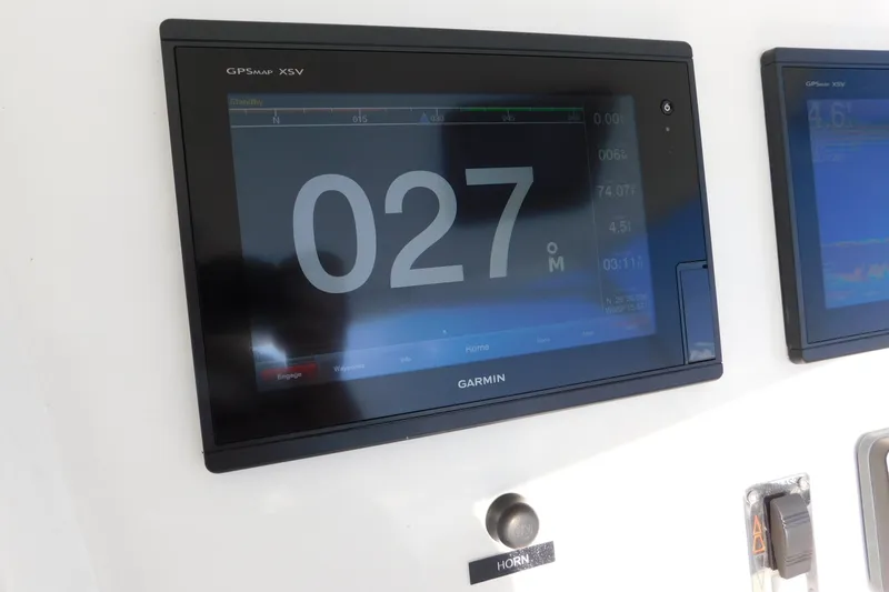 Slide: The Image of Garmin GPS display on 1996 Viking 50 Convertible yacht dashboard. - 18