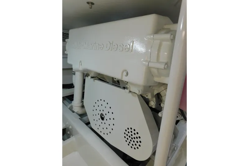 Slide: The Image of Engine compartment of a 1996 Viking 50 Convertible boat with MAN Marine Diesel engine. - 72