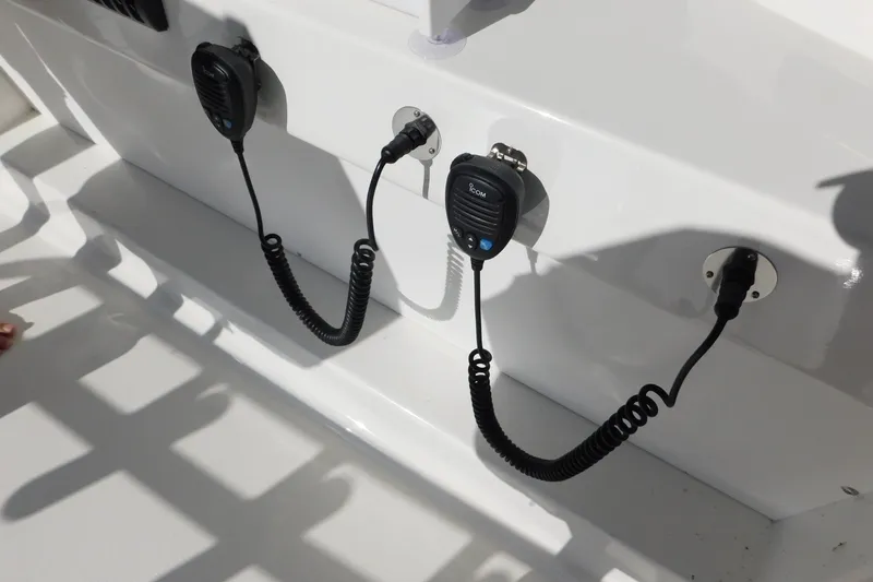 Slide: The Image of Two marine radios on a 1996 Viking 50 Convertible yacht. - 14