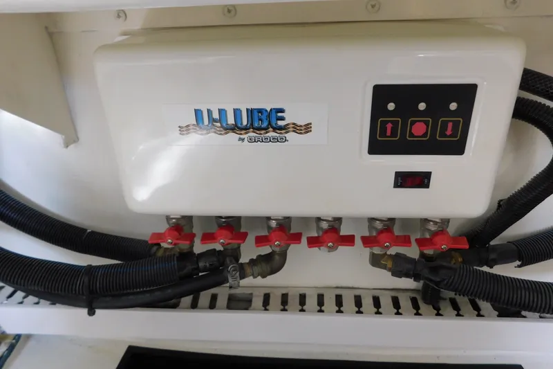 Slide: The Image of Engine room control panel on a 1996 Viking 50 Convertible boat. - 82