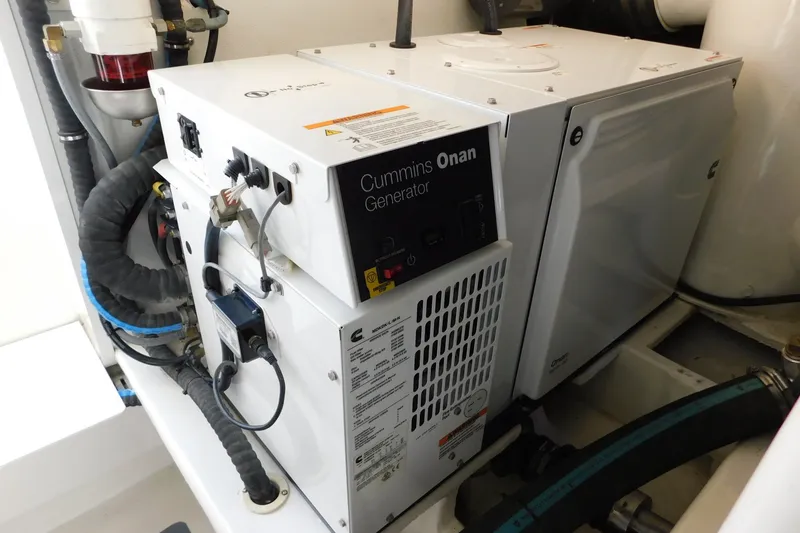 Slide: The Image of Cummins Onan generator in 1996 Viking 50 Convertible yacht engine room. - 69