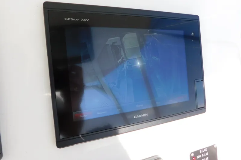 Slide: The Image of Garmin GPSMAP XSV display on 1996 Viking 50 Convertible yacht dashboard. - 17