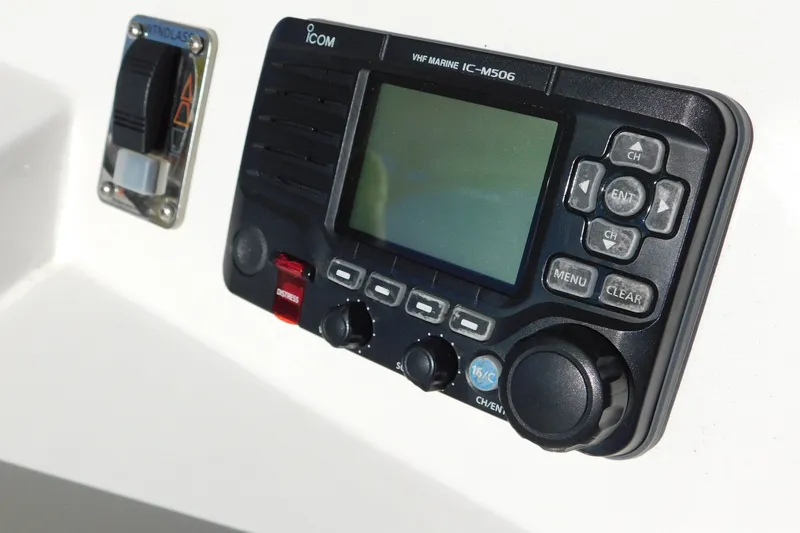 Slide: The Image of VHF marine radio on 1996 Viking 50 Convertible boat dashboard. - 19