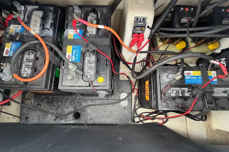 Slide: The Image of Battery compartment of 2024 Nitro Z20 boat with multiple connected batteries. - 75