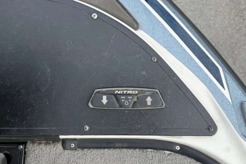 Slide: The Image of Control panel of a 2024 Nitro Z20 boat with directional arrows. - 45