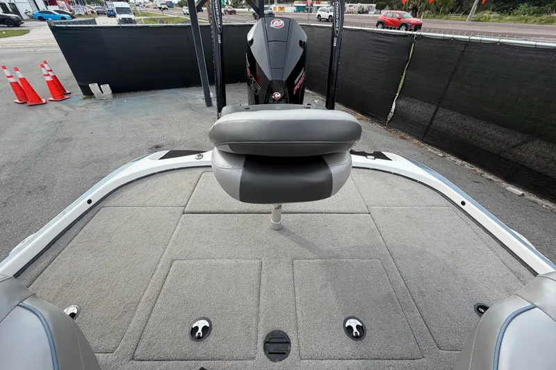 Slide: The Image of 2024 Nitro Z20 boat interior with seating and carpeted deck. - 64
