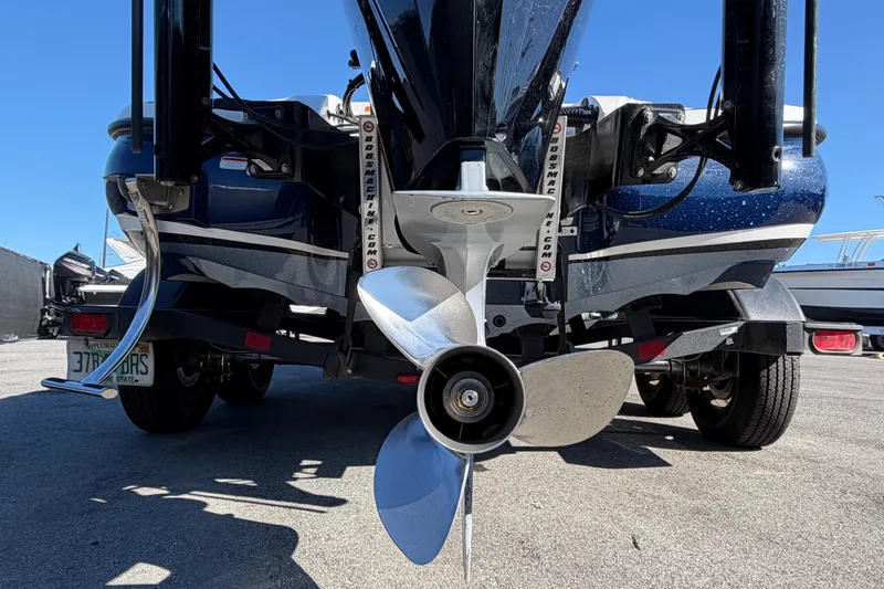 Slide: The Image of Rear view of a 2024 Nitro Z20 boat with a shiny propeller. - 5