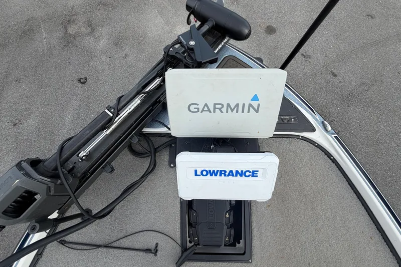 Slide: The Image of Fishing boat electronics setup with Garmin and Lowrance devices on a 2024 Nitro Z20. - 42