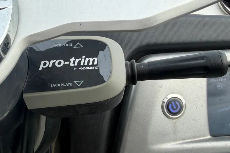 Slide: The Image of 2024 Nitro Z20 boat control panel with Pro-Trim by Dometic jackplate switch. - 28