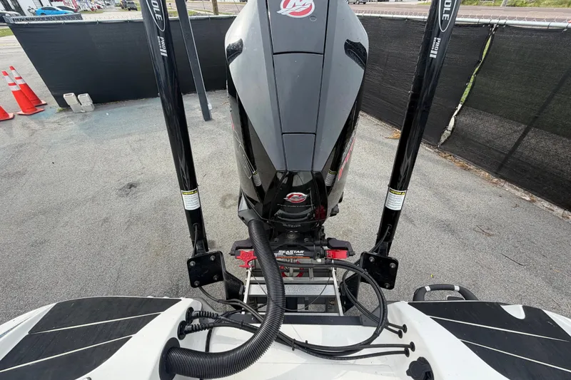 Slide: The Image of 2024 Nitro Z20 boat engine with dual Power-Pole anchors on a concrete surface. - 79