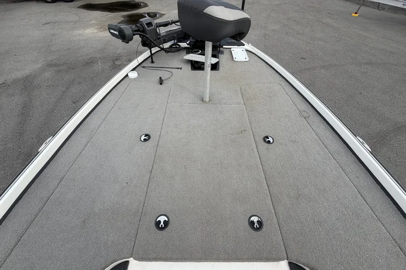 Slide: The Image of 2024 Nitro Z20 boat deck with seating and trolling motor, ideal for fishing. - 33