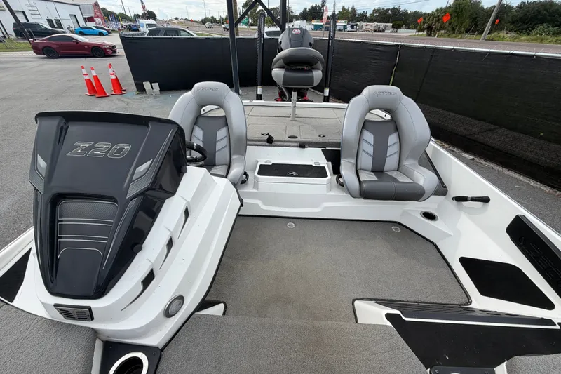 Slide: The Image of 2024 Nitro Z20 boat interior with dual seats and steering console. - 56