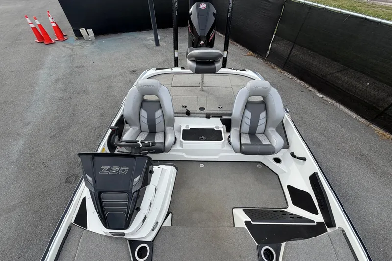 Slide: The Image of 2024 Nitro Z20 boat interior with dual seats and storage compartments. - 55