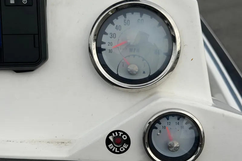 Slide: The Image of Dashboard of 2024 Nitro Z20 boat with speedometer and voltmeter gauges. - 24