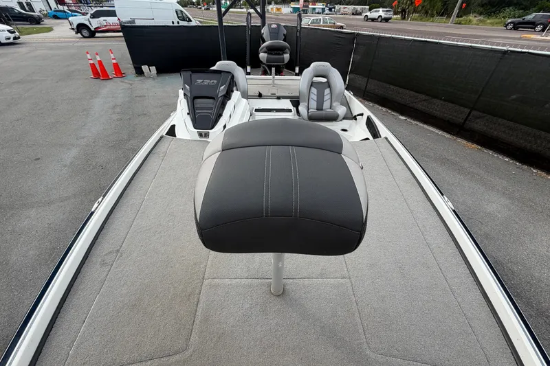 Slide: The Image of 2024 Nitro Z20 boat interior with seating and carpeted deck. - 51