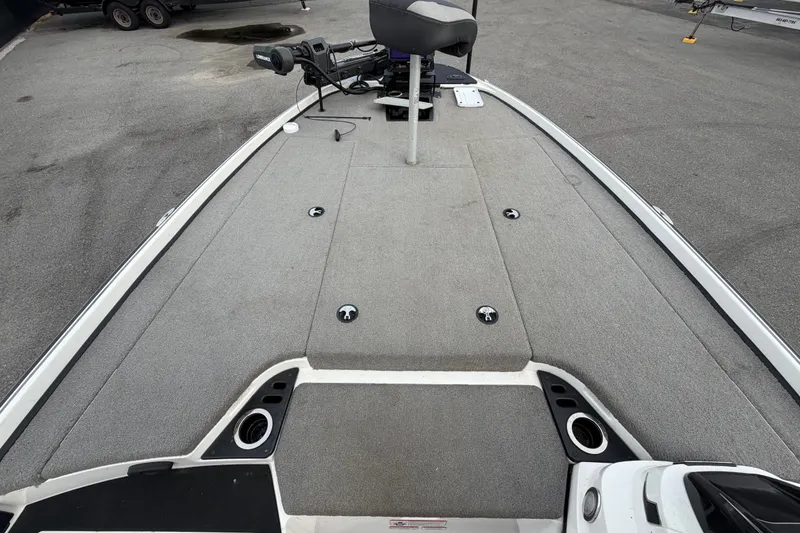 Slide: The Image of 2024 Nitro Z20 boat deck with seating and fishing equipment. - 32