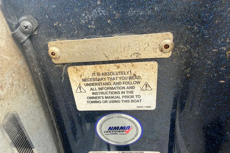 Slide: The Image of 2024 Nitro Z20 boat identification plate with safety instructions and certification label. - 83