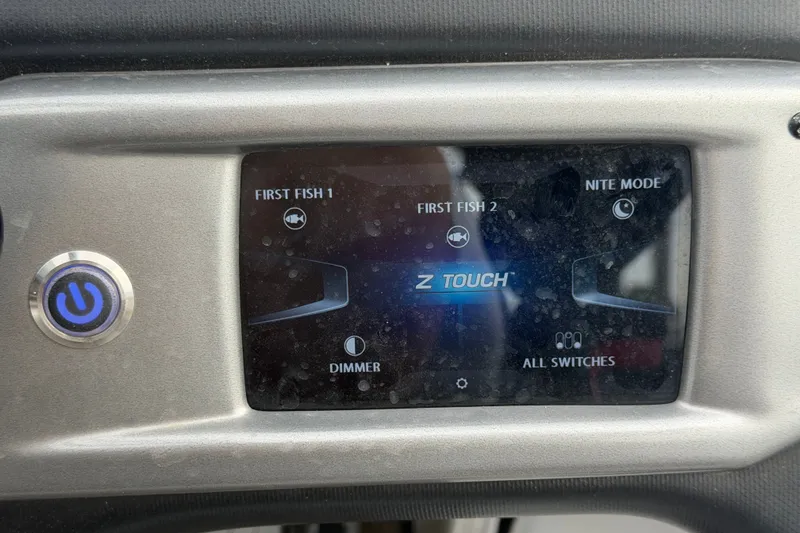 Slide: The Image of 2024 Nitro Z20 dashboard with Z Touch display, featuring fish finder and night mode controls. - 22