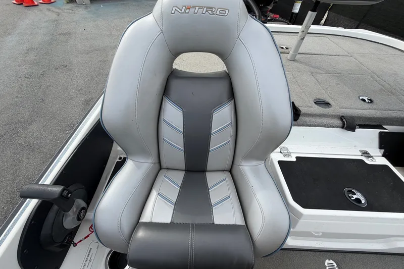 Slide: The Image of 2024 Nitro Z20 boat seat with gray and black upholstery, featuring ergonomic design. - 62
