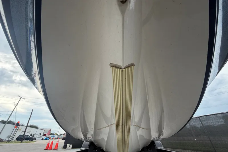 Slide: The Image of 2024 Nitro Z20 boat hull close-up, showcasing sleek design and structure. - 12