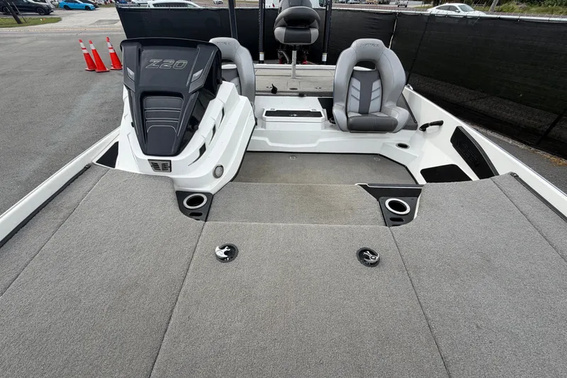 Slide: The Image of 2024 Nitro Z20 boat interior with seating and storage compartments. - 54