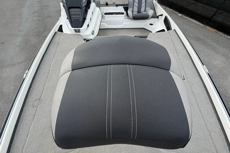 Slide: The Image of 2024 Nitro Z20 boat interior with cushioned seating and sleek design. - 52