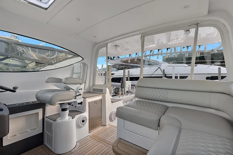 Slide: The Image of Luxurious interior of 2021 Jupiter 41 SB yacht with plush seating and modern helm. - 14