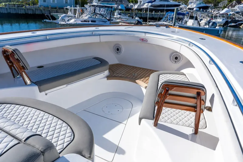 Slide: The Image of Luxurious 2022 Valhalla V-46 yacht interior with elegant seating and wood accents. - 48