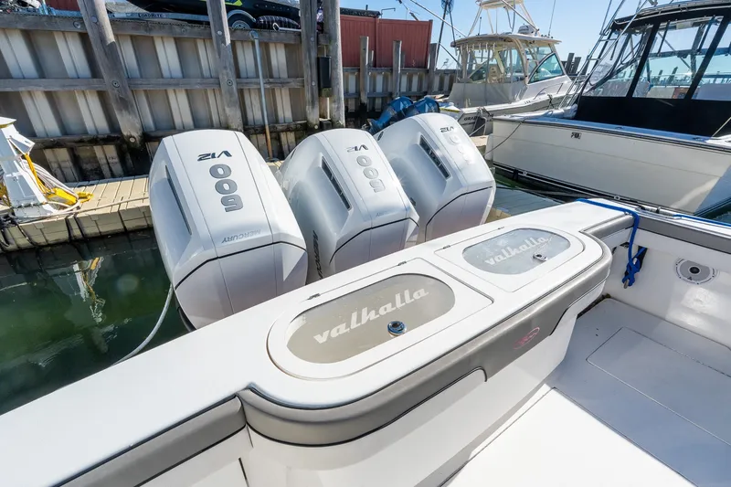 Slide: The Image of 2022 Valhalla V-46 boat with powerful Mercury 600 V12 engines docked at marina. - 5
