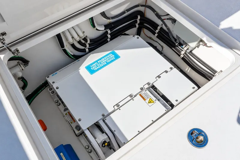 Slide: The Image of Electrical system compartment of 2022 Valhalla V-46 boat, showcasing wiring and components. - 13