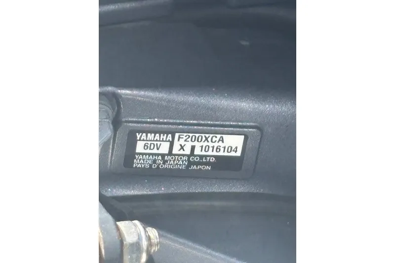 Slide: The Image of Yamaha F200XCA engine label on 2021 Chaparral 280 OSX, made in Japan. - 51