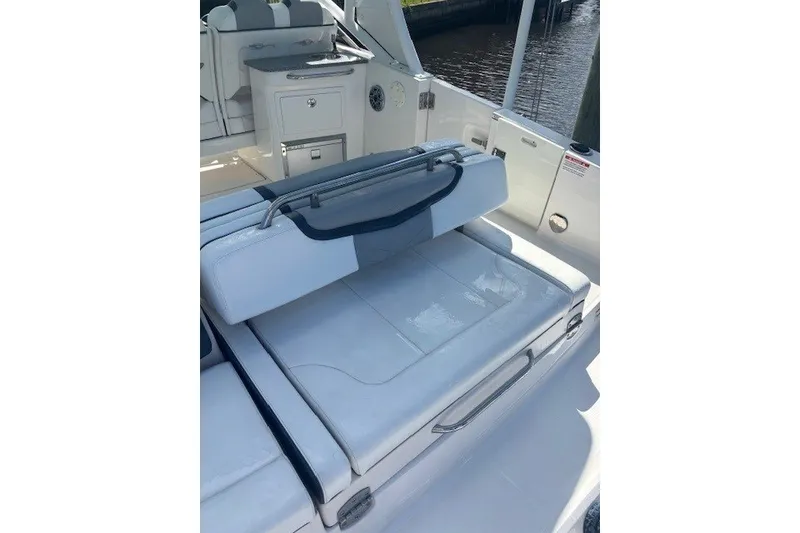 Slide: The Image of 2021 Chaparral 280 OSX boat interior with adjustable seating and sleek design. - 39