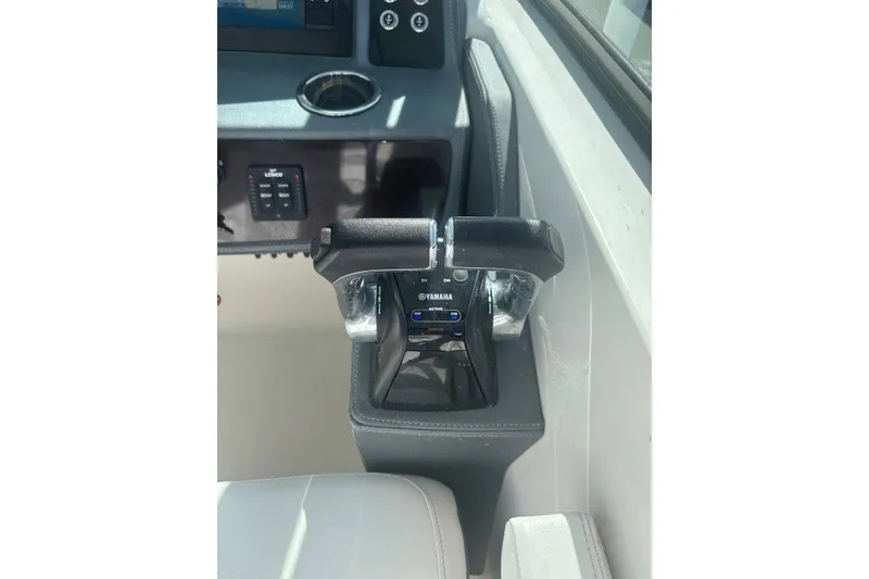 Slide: The Image of Control panel of a 2021 Chaparral 280 OSX boat with Yamaha throttle. - 21