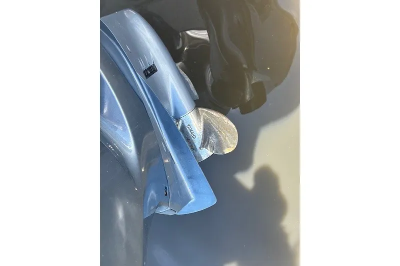 Slide: The Image of 2021 Chaparral 280 OSX boat propeller in water, featuring Yamaha branding. - 45