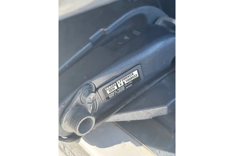 Slide: The Image of Close-up of Yamaha LF200XCA engine part on 2021 Chaparral 280 OSX boat. - 50
