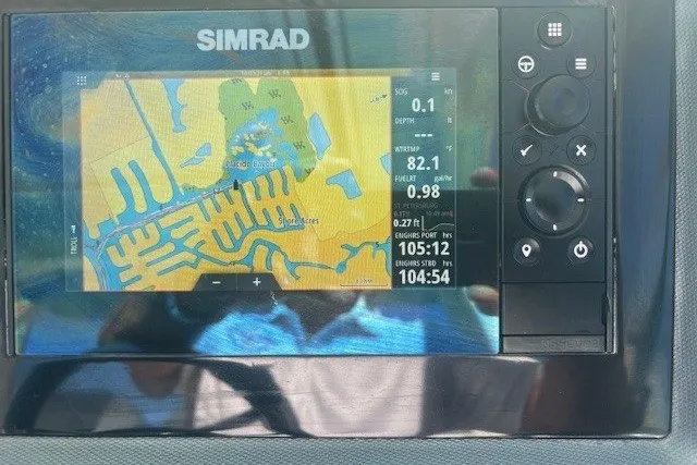 Slide: The Image of Simrad navigation display on 2021 Chaparral 280 OSX boat, showing detailed waterway map. - 17
