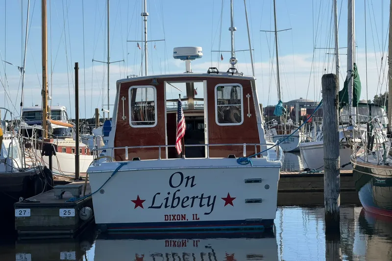 Slide: The Image of 1973 Chris-Craft 31 Sedan Cruiser "On Liberty" docked in Dixon, IL marina. - 71