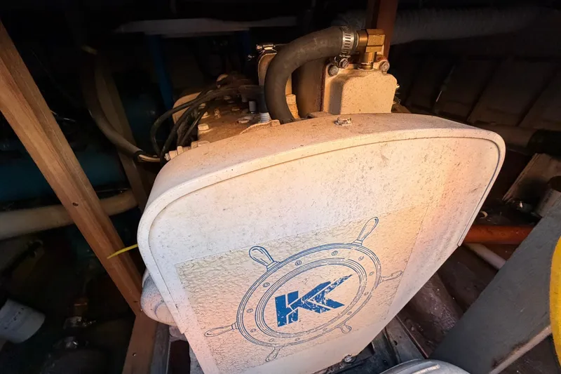 Slide: The Image of Engine compartment of a 1973 Chris-Craft 31 Sedan Cruiser with visible components. - 16