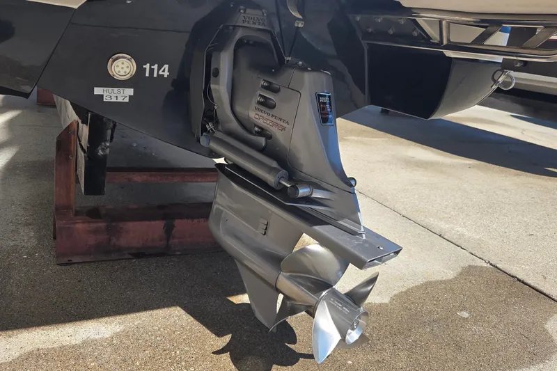 Slide: The Image of 2005 Cobalt 272 boat with Volvo Penta outdrive, showcasing propeller and hull details. - 20