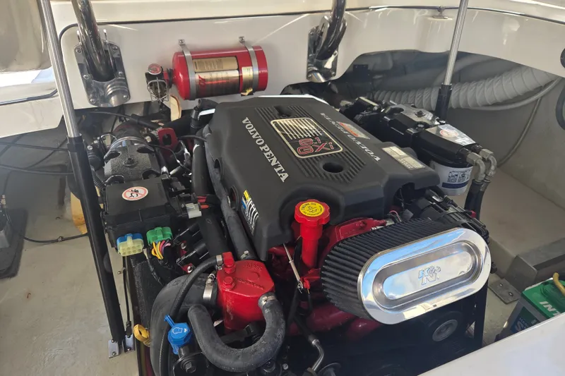 Slide: The Image of Engine compartment of a 2005 Cobalt 272 boat featuring a Volvo Penta engine. - 18