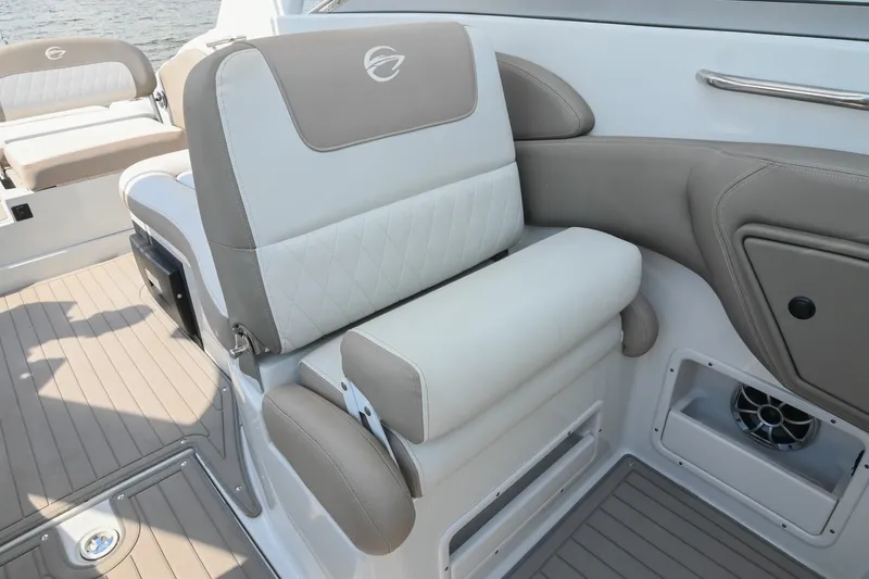 Slide: The Image of 2020 Crownline Eclipse E305 XS boat interior with cushioned seating and sleek design. - 34