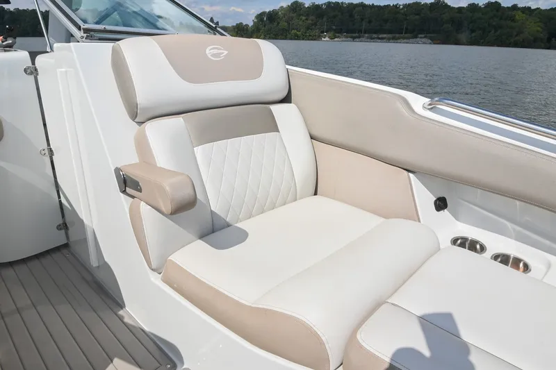 Slide: The Image of Luxurious seating on 2020 Crownline Eclipse E305 XS boat, with lake view. - 47