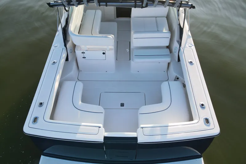 Slide: The Image of 2003 Tiara Yachts 2900 Coronet boat interior with spacious seating and sleek design. - 21