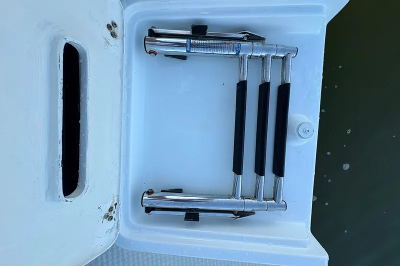 Slide: The Image of Foldable swim ladder on a 2003 Tiara Yachts 2900 Coronet boat. - 29